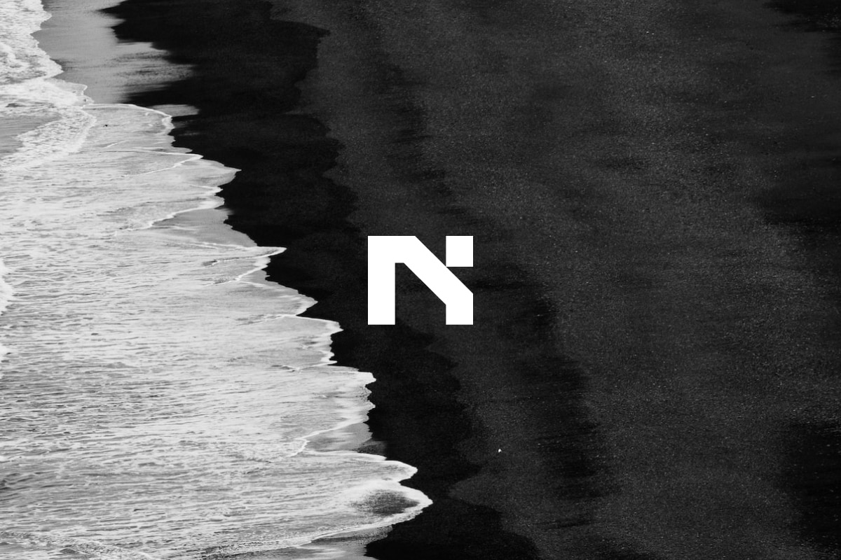 A person sitting at a desk in front of a computer