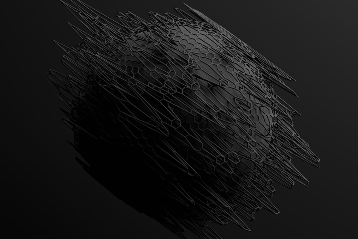 A person sitting at a desk in front of a computer